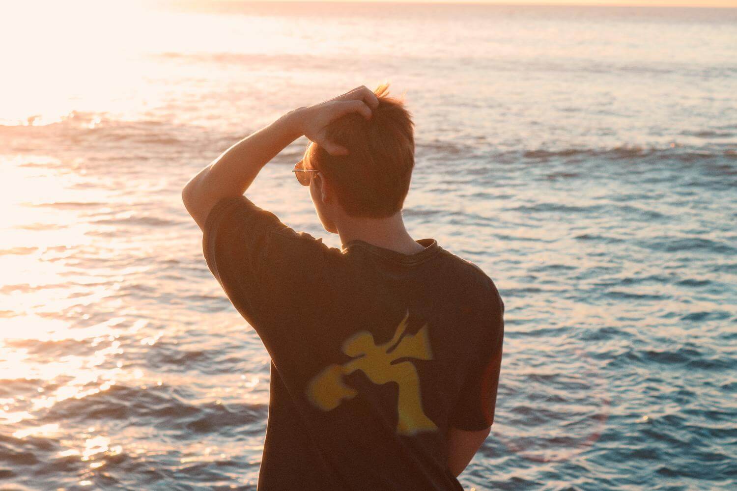 Jonah Genser wide falling man back tshirt freestlye trampoline